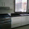 Cocina empotrada, bar y mueble Tv